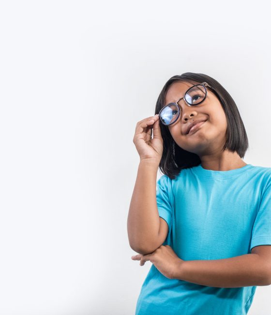 Little girl thinking in studio shot